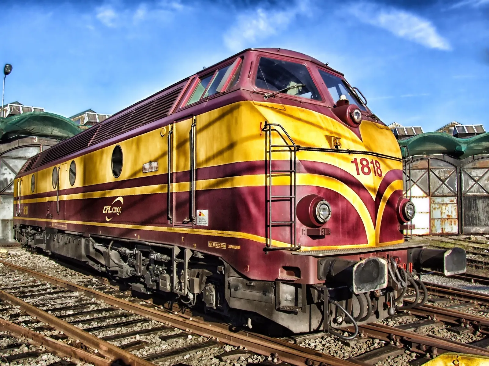 Historic diesel locomotive at a railway depot